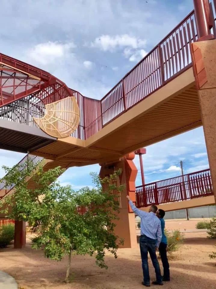 Metal painting services on a public bridge