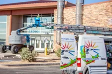 Professional painting services on a commercial building