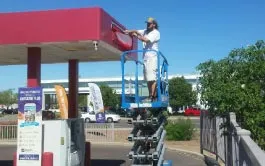 Commercial painting services on a gas station
